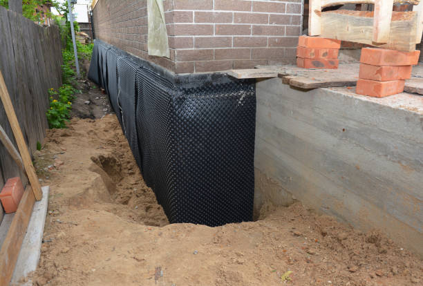 Happy homeowners after waterproofing job in Carlstadt